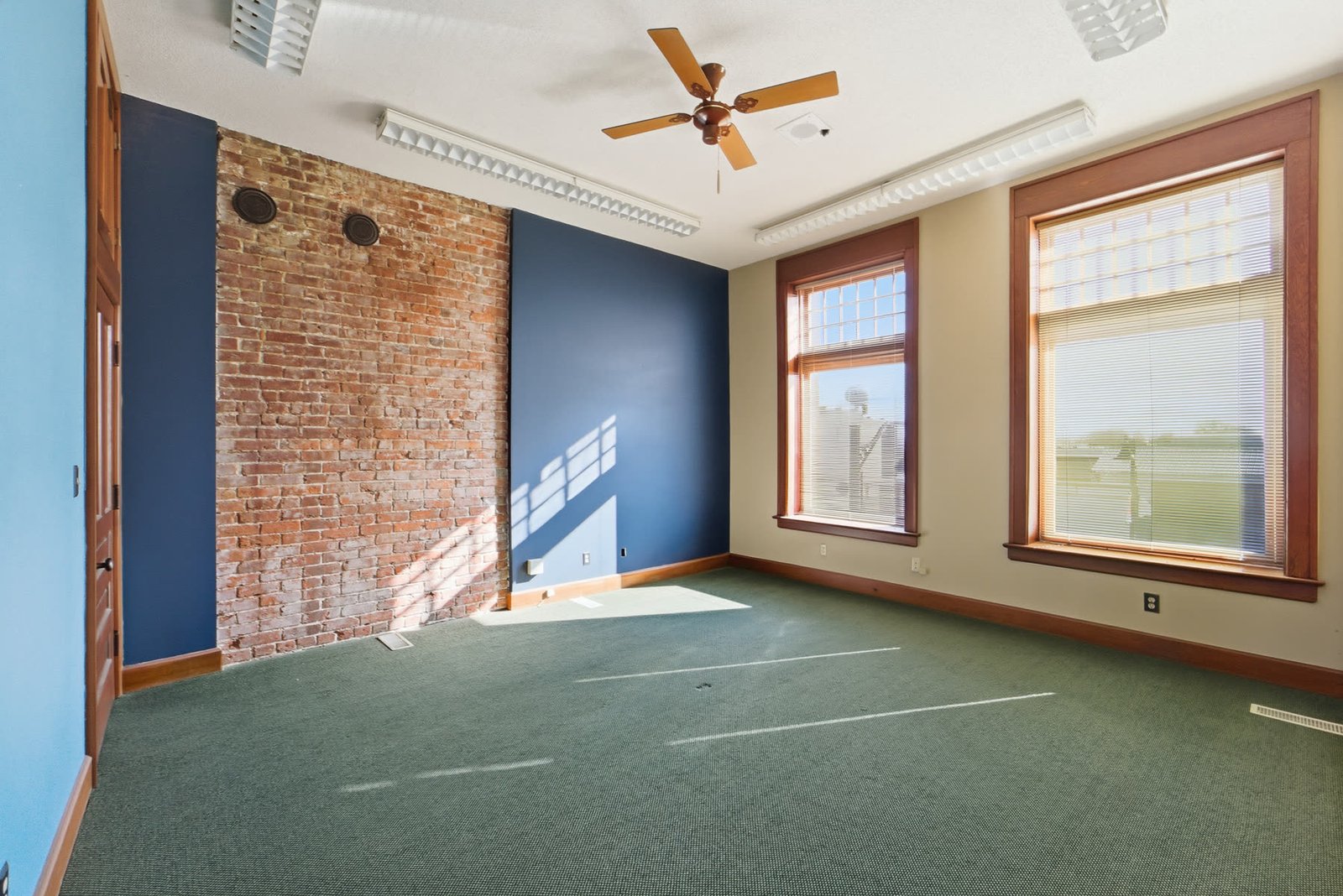 Brick, tile, and woodwork in the lobby